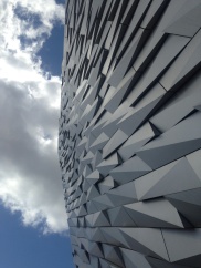 "A precipitous, four-storey sheer wall of artificially oxidised and randomly profiled steel panels dramatically recalls the fractured terrain of the exterior cladding" - The Titanic Belfast: The ship comes home building.co.uk/the-terrain-belfast-the-ship-comes-home/5034432.article